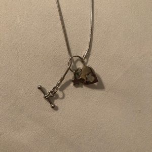 A heart and star cut out necklace